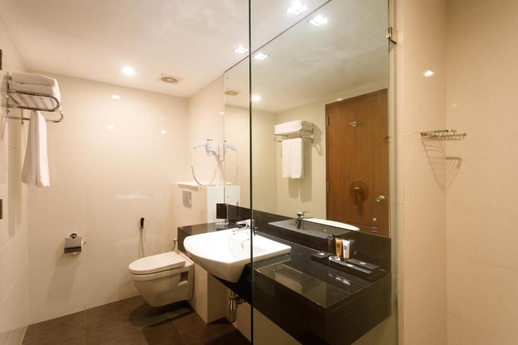 Koupelna v ubytování Renuka City Hotel