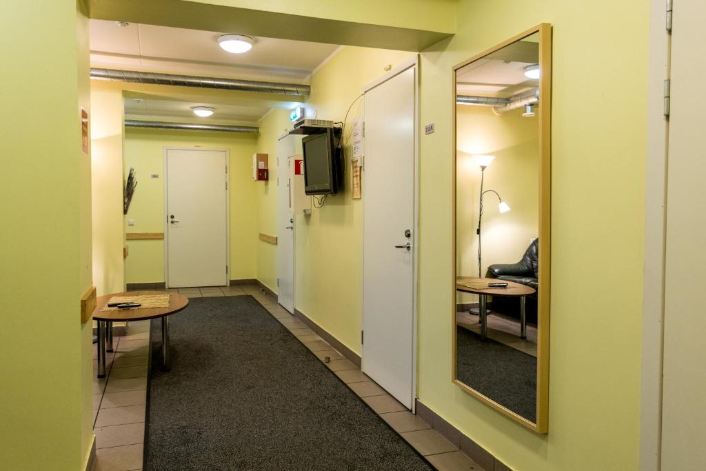 Televiisor ja/või meelelahutuskeskus majutusasutuses Guesthouse Rehab
