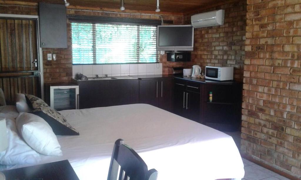 Dapur atau dapur kecil di The Lazy Grape Guest Lodge & Spa