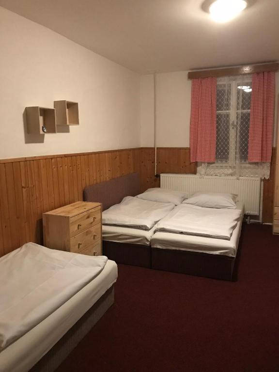 Postel nebo postele na pokoji v ubytování Chata Luna