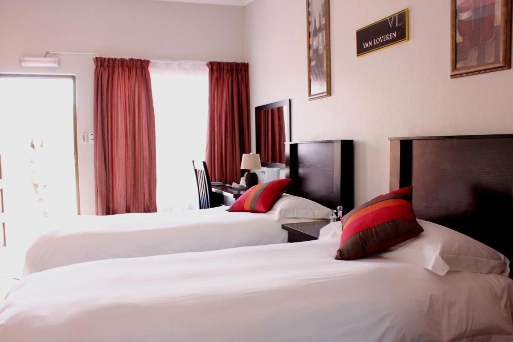 Katil atau katil-katil dalam bilik di The Lazy Grape Guest Lodge & Spa