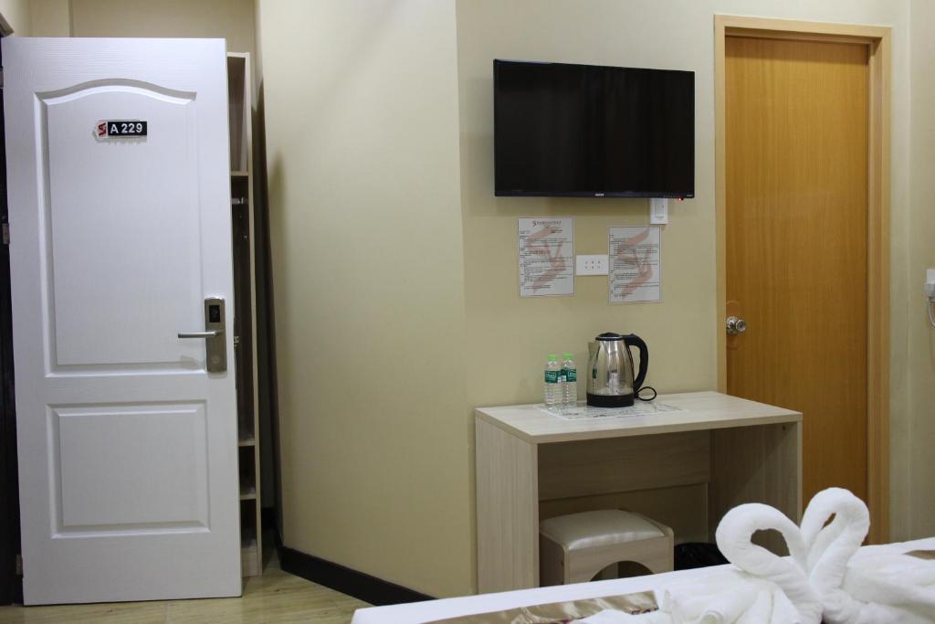 Kuchyň nebo kuchyňský kout v ubytování Southview Hotel