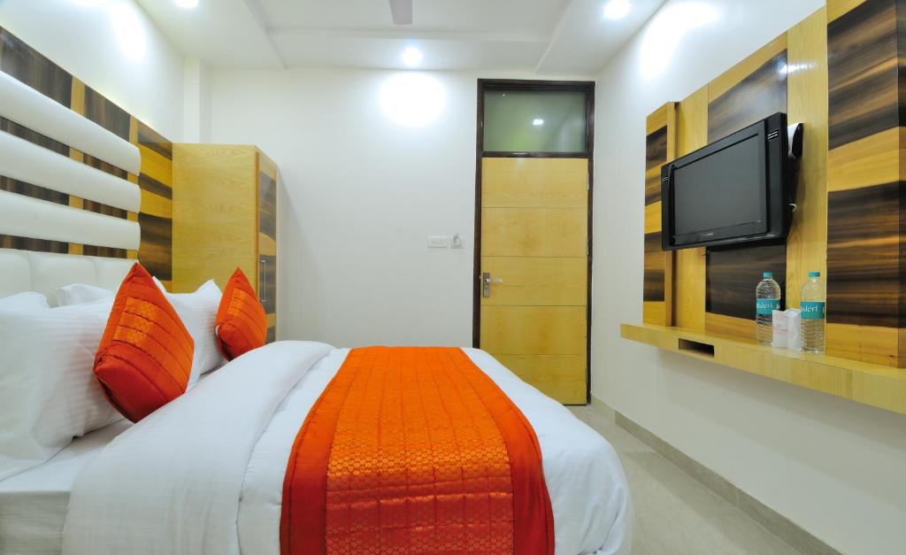 Postel nebo postele na pokoji v ubytování The Gold Inn - Paharganj