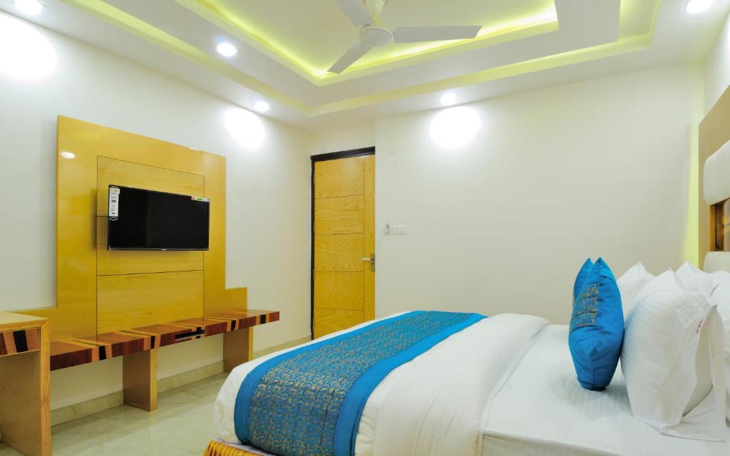 Postel nebo postele na pokoji v ubytování The Gold Inn - Paharganj