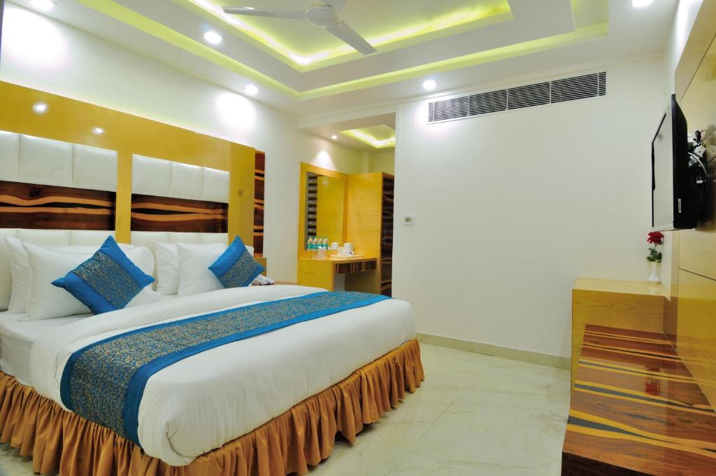Postel nebo postele na pokoji v ubytování The Gold Inn - Paharganj