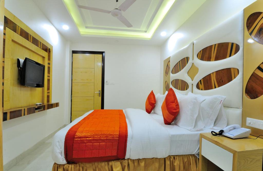 Postel nebo postele na pokoji v ubytování The Gold Inn - Paharganj