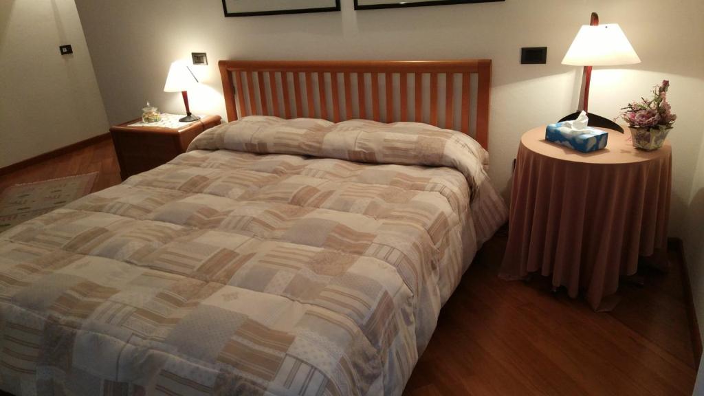 Postel nebo postele na pokoji v ubytování Marinella B&B