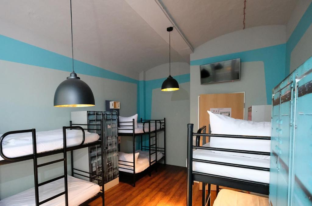 Postel nebo postele na pokoji v ubytování Singer109 Hostel, Hotel & Apartment