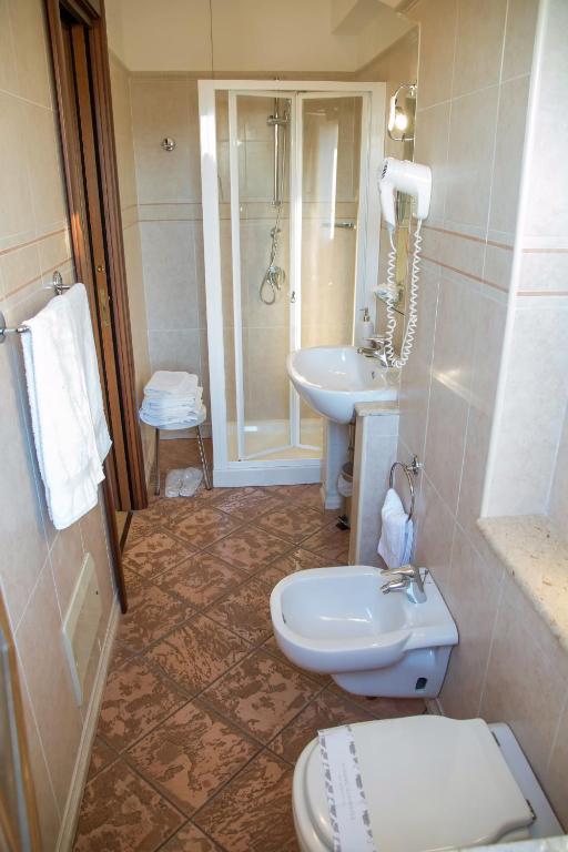 Koupelna v ubytování Palmed Hotel
