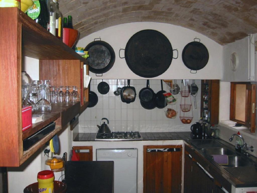 Kuchyň nebo kuchyňský kout v ubytování Sa Paret Nova