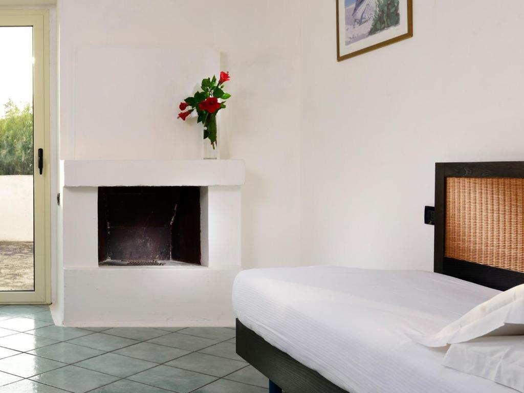 Postel nebo postele na pokoji v ubytování TH Ostuni - Ostuni Village