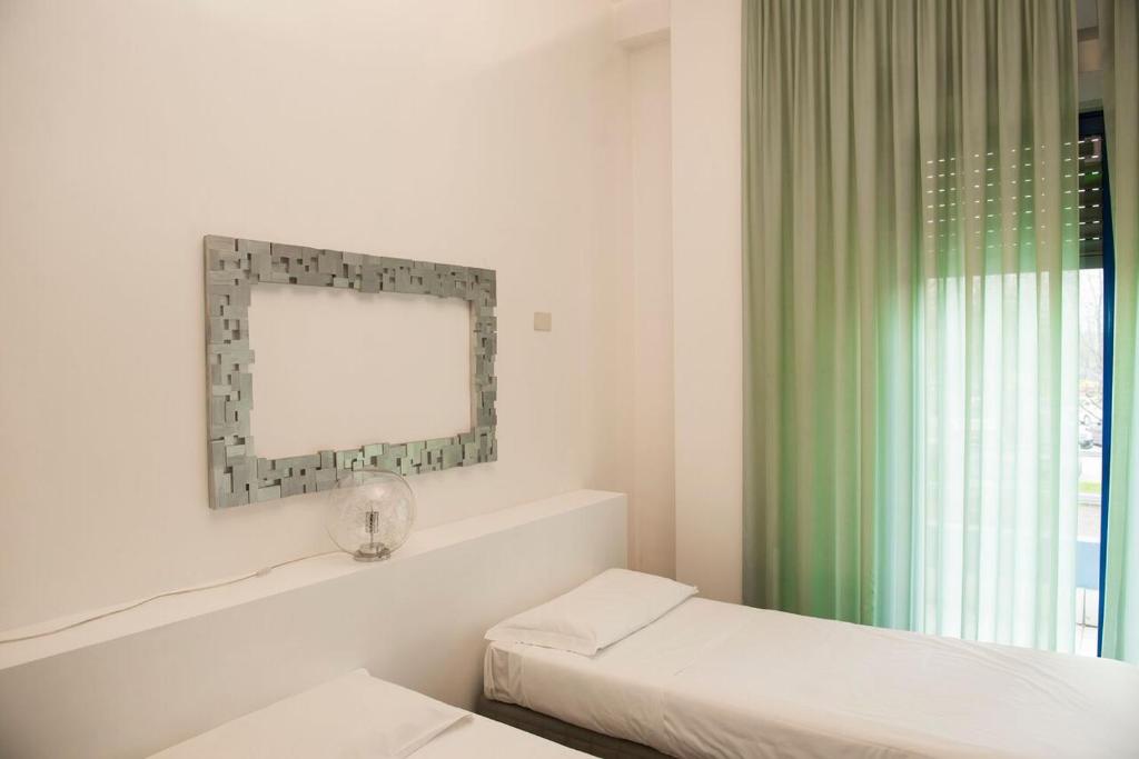 Postel nebo postele na pokoji v ubytování Park Hotel Residence