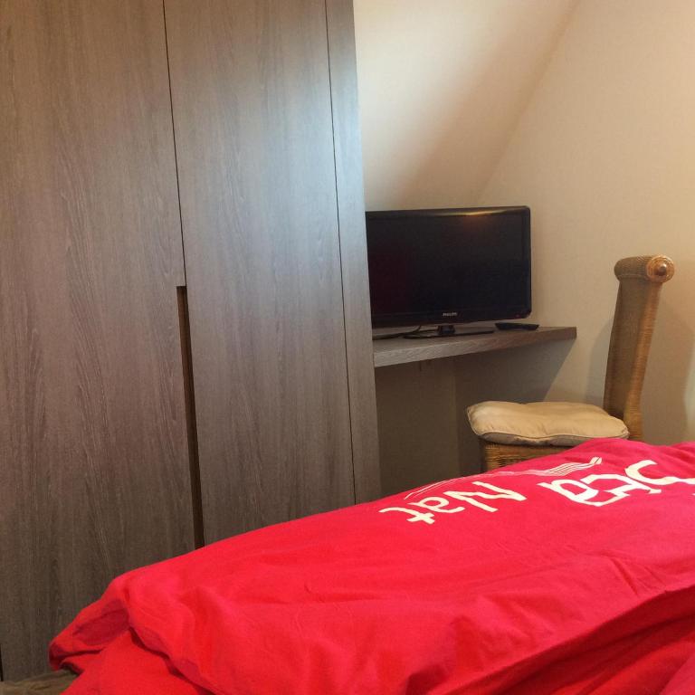 Voodi või voodid majutusasutuse B&B wellness Sea Nat voor Naturisten toas
