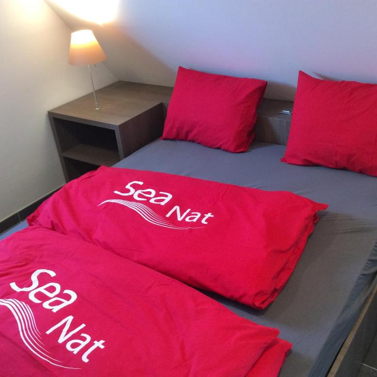 Voodi või voodid majutusasutuse B&B wellness Sea Nat voor Naturisten toas