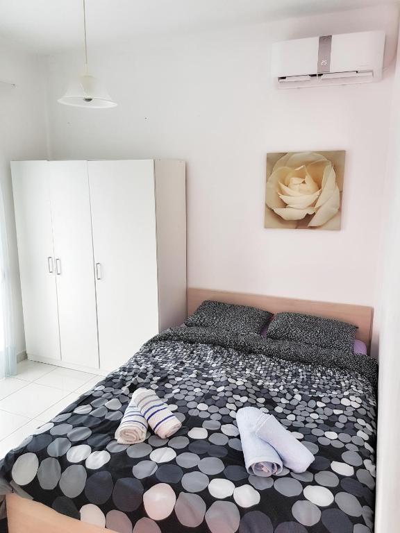 Posteľ alebo postele v izbe v ubytovaní Stavrini's House