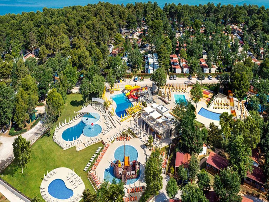 an aerial view of a resort with a pool at Easyatent Mobile home Lanterna in Poreč