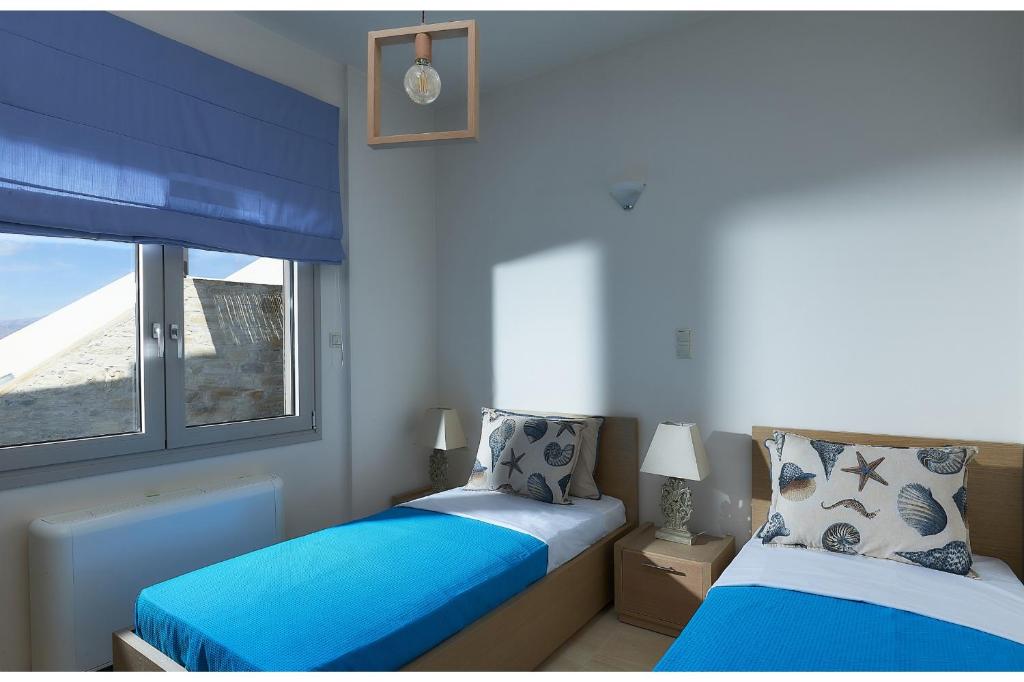 A bed or beds in a room at Elkysti Crete