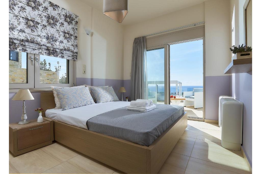 A bed or beds in a room at Elkysti Crete