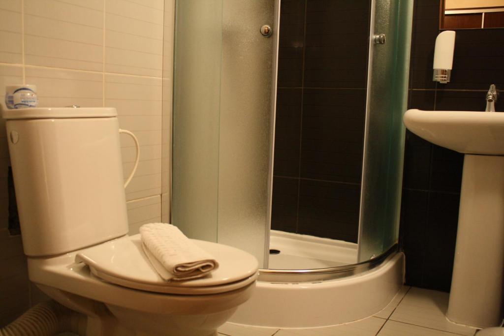 Koupelna v ubytování Garni Hotel Cosmopolitan
