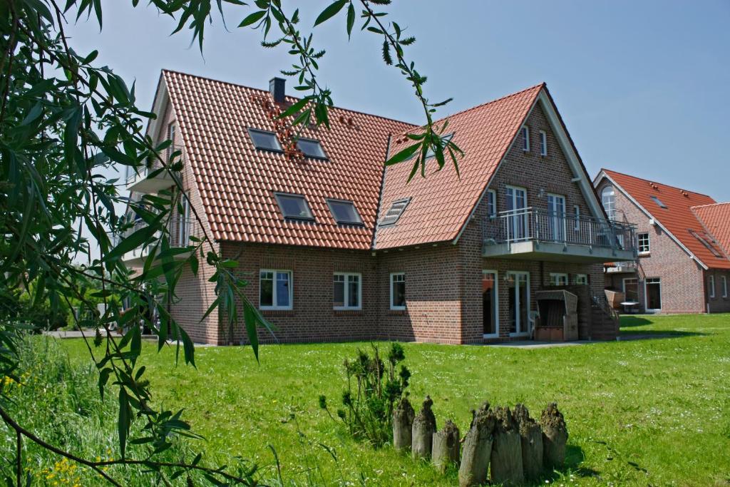 Villa Arosa Ostseetraum - 公寓设有独立卧室和露台 2“Arosa 2a”