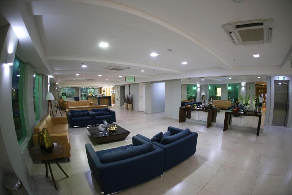 Uma área de estar em Real Classic Bahia Hotel