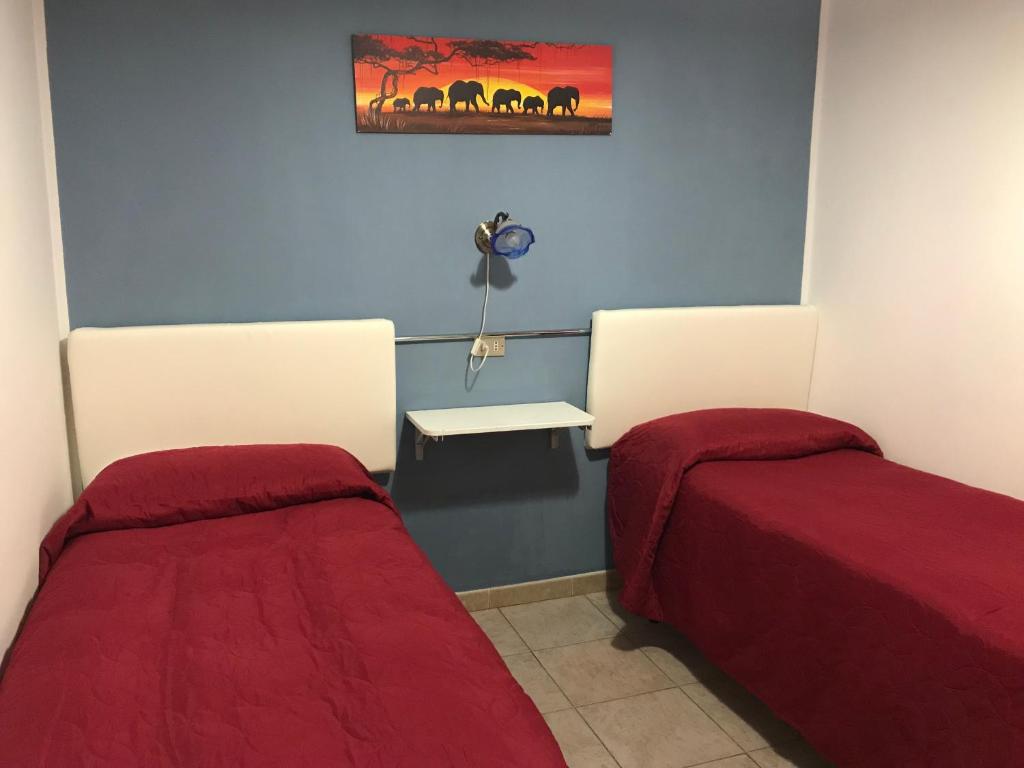Postel nebo postele na pokoji v ubytování B&B New Triscele