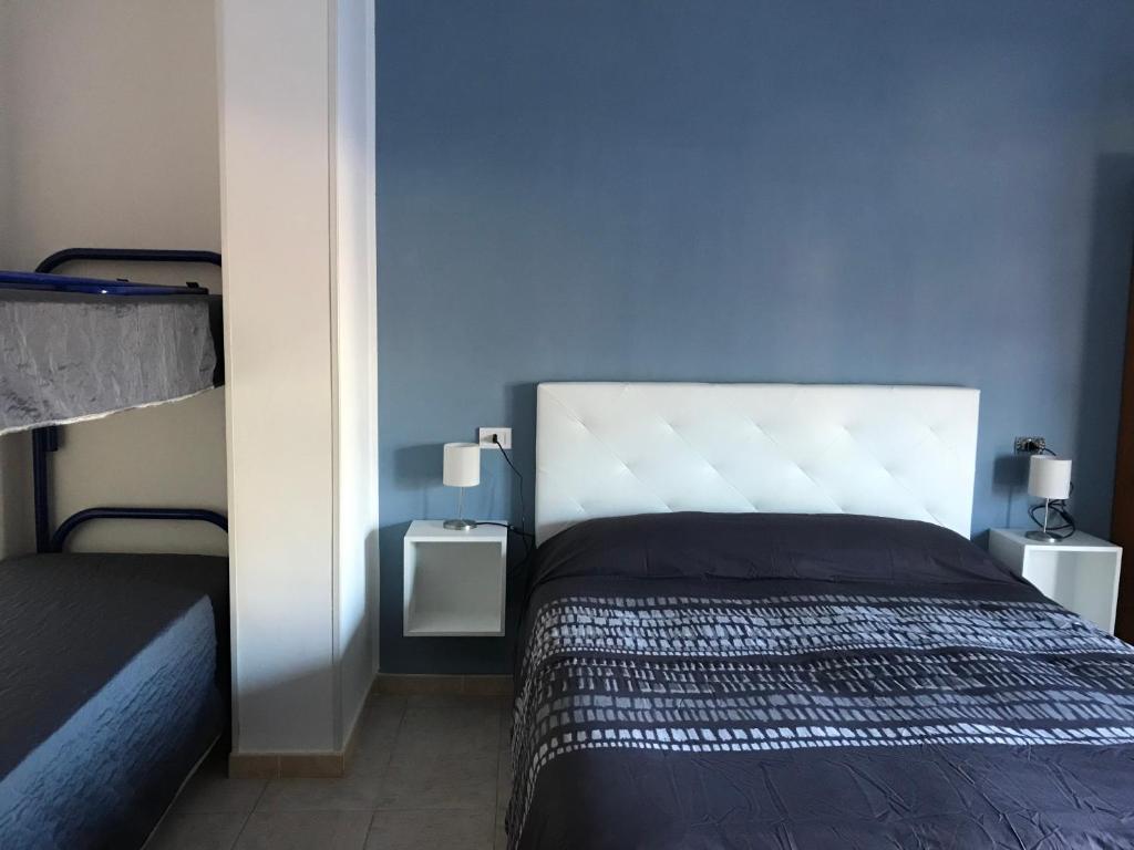 Postel nebo postele na pokoji v ubytování B&B New Triscele