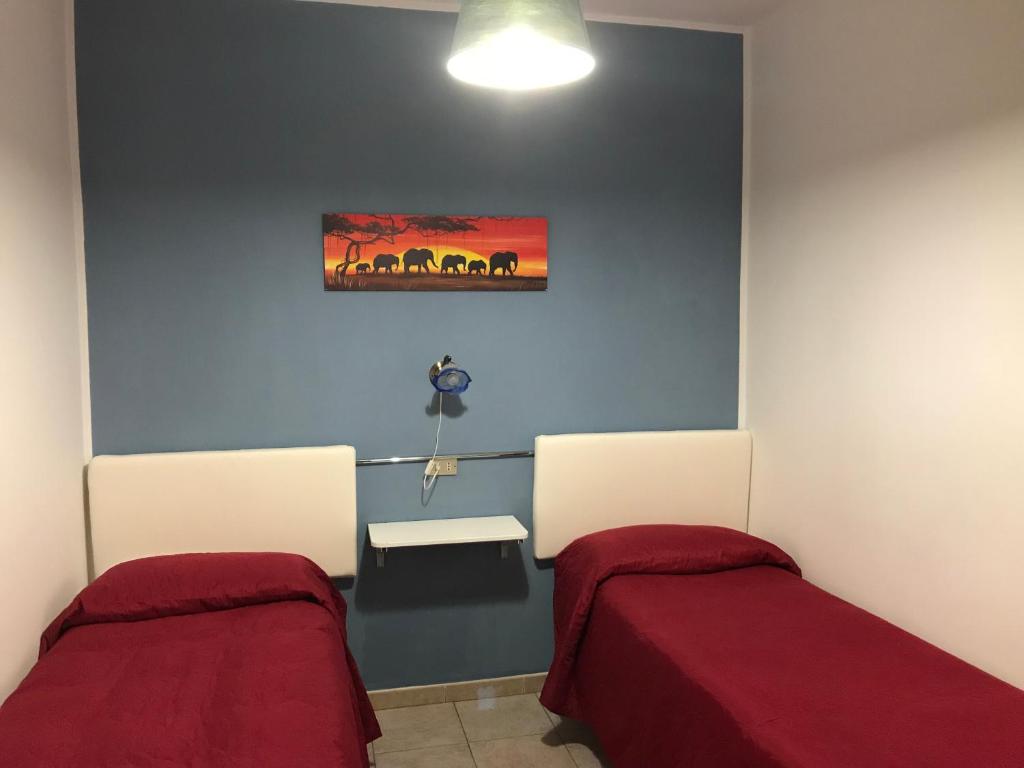 Postel nebo postele na pokoji v ubytování B&B New Triscele