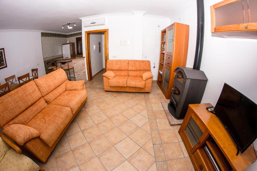 Μια τηλεόραση ή/και κέντρο ψυχαγωγίας στο Apartamento Los Arcos