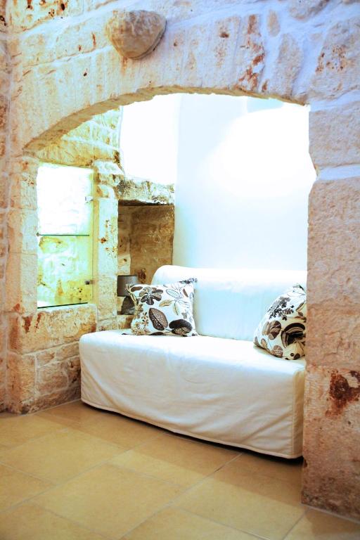 A bed or beds in a room at Dimora Morello