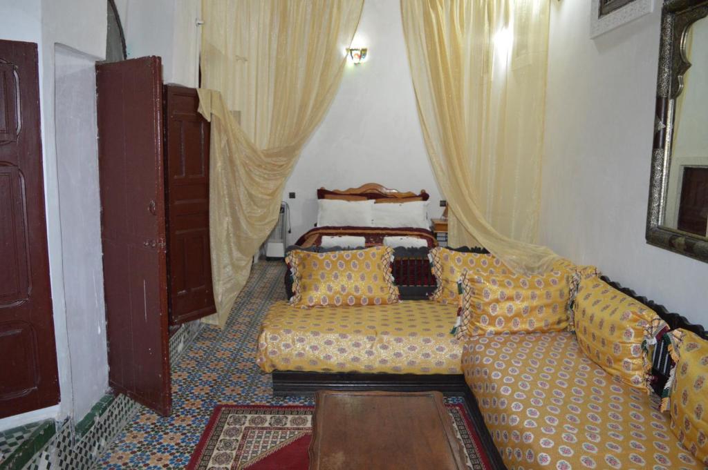 Postel nebo postele na pokoji v ubytování Chez L'habitant Boueden