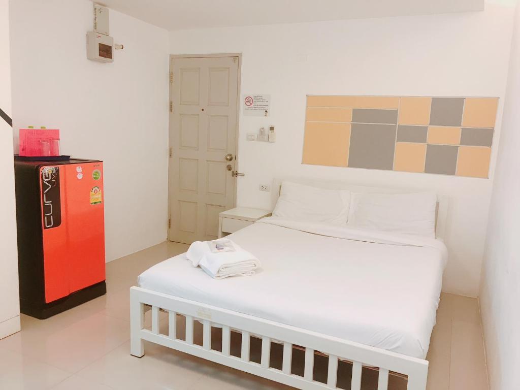 Postel nebo postele na pokoji v ubytování PDA Lord Hotel