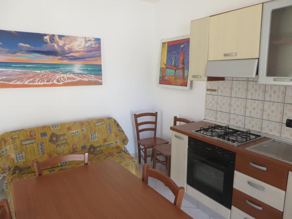 Kuchyň nebo kuchyňský kout v ubytování Residence Giglio