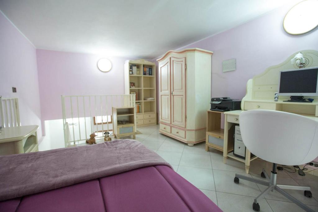 Televízia a/alebo spoločenská miestnosť v ubytovaní Suite Orchidea by Dimorra
