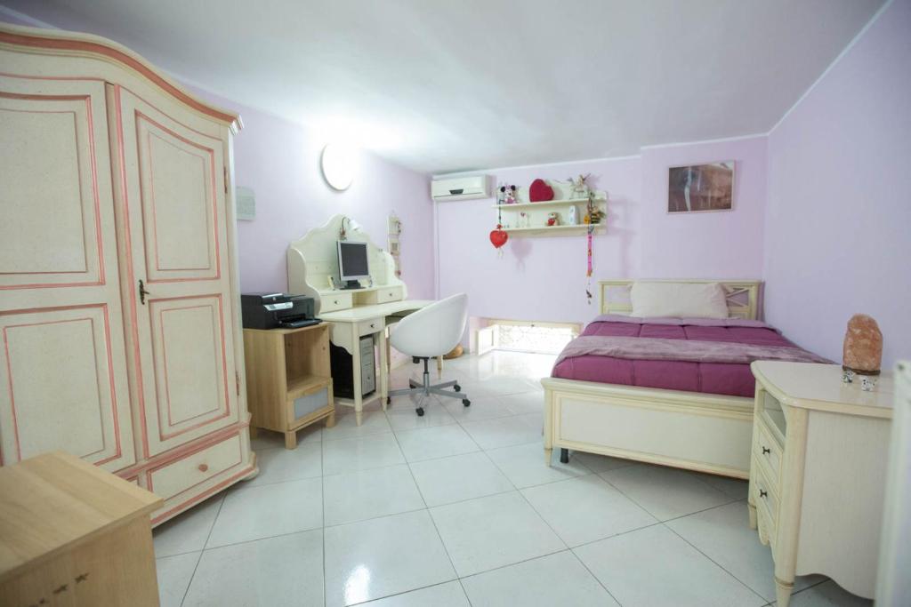 Posteľ alebo postele v izbe v ubytovaní Suite Orchidea by Dimorra