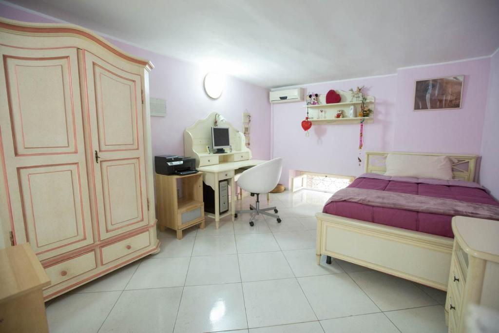 Posteľ alebo postele v izbe v ubytovaní Suite Orchidea by Dimorra