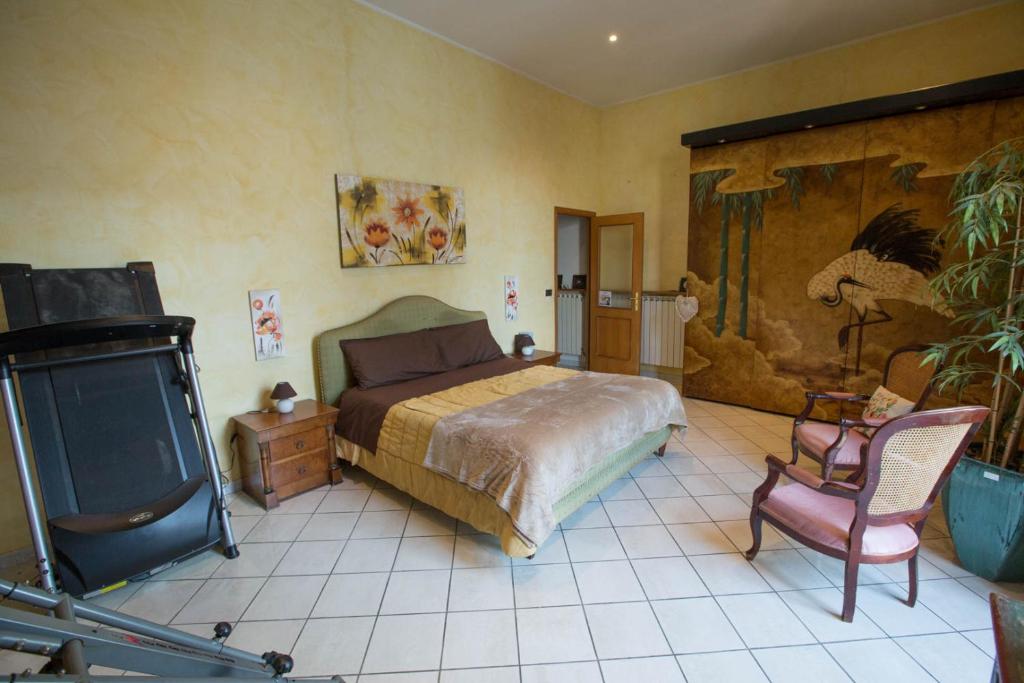 Posteľ alebo postele v izbe v ubytovaní Suite Orchidea by Dimorra