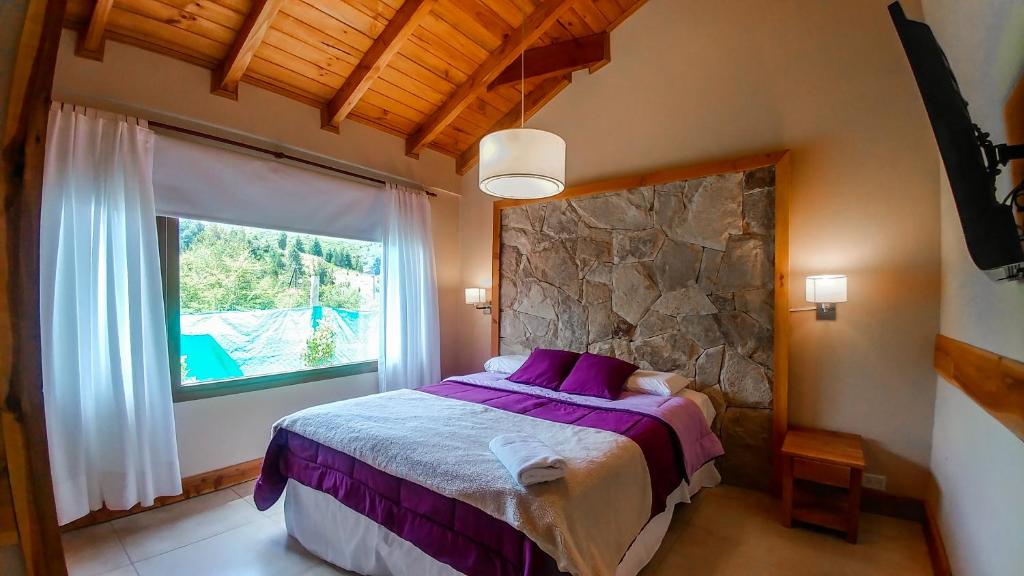 Postel nebo postele na pokoji v ubytování Kurtem Lodge