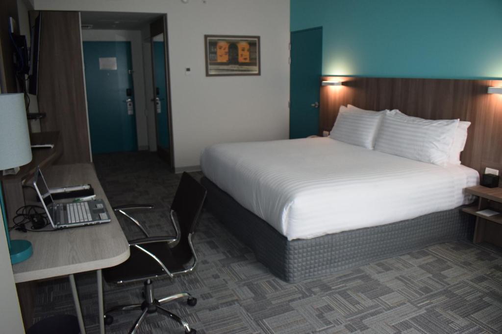 Postel nebo postele na pokoji v ubytování Holiday Inn - Lima Airport by IHG