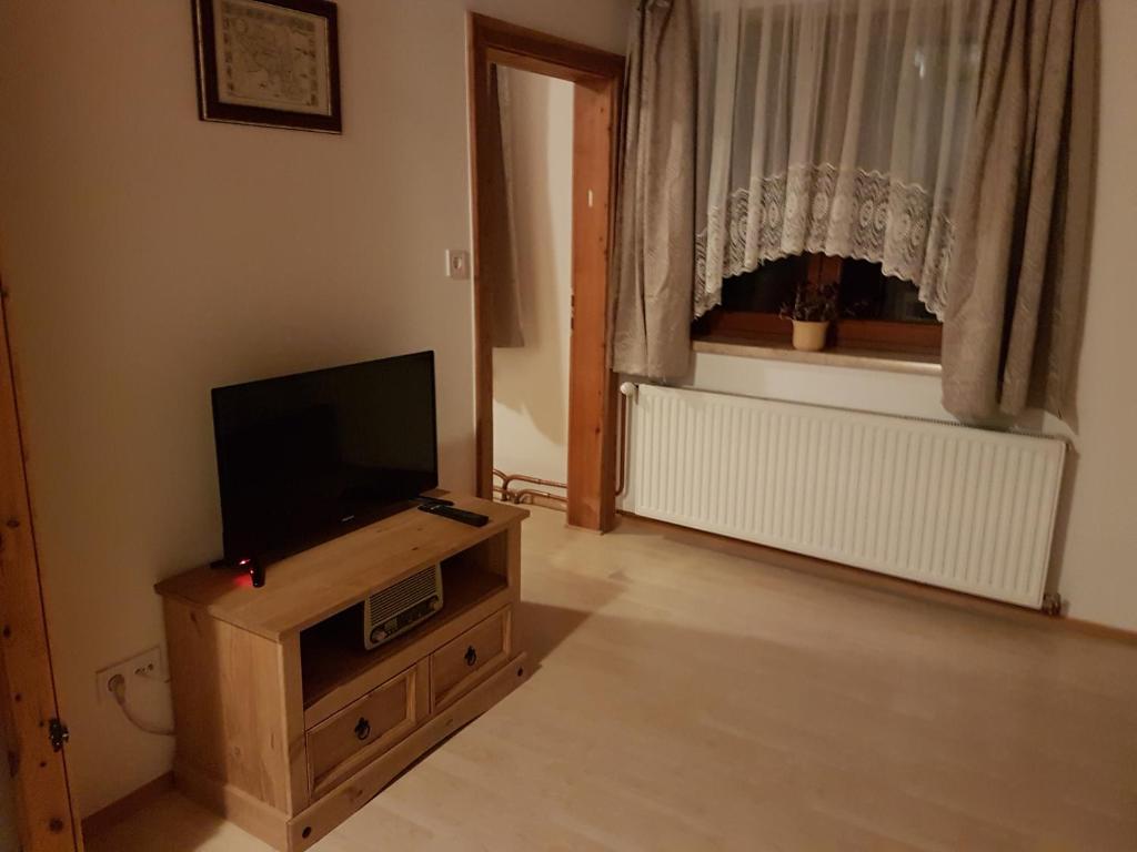 TV a/nebo společenská místnost v ubytování Berliner Ecke