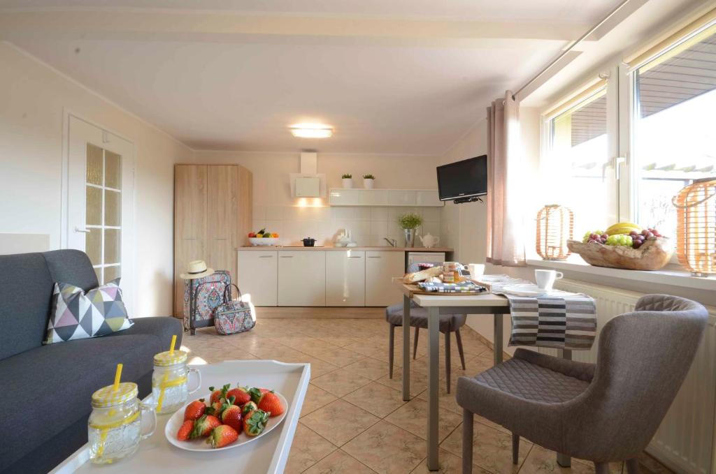 Kuchyňa alebo kuchynka v ubytovaní Arenda Apartamenty&Domki całoroczne