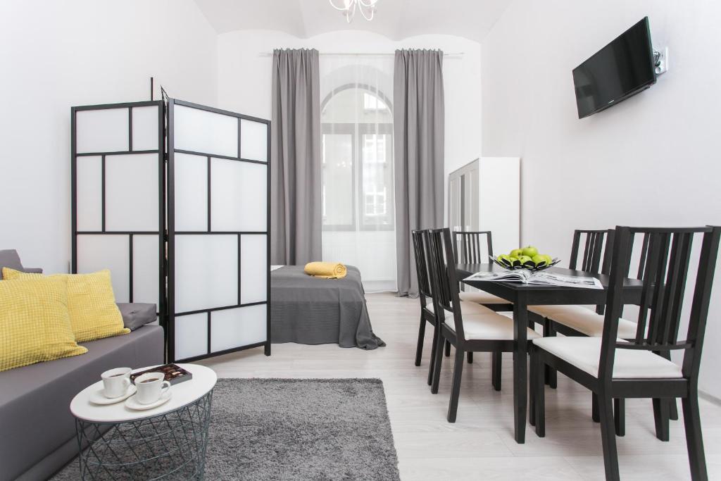 Televízia a/alebo spoločenská miestnosť v ubytovaní Krakow B&B - Old Town
