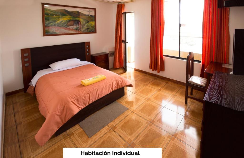 Postel nebo postele na pokoji v ubytování Mashy´s Hostal