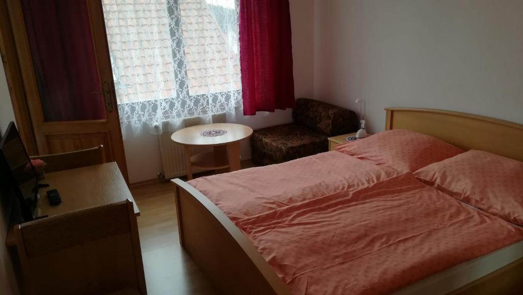 Postel nebo postele na pokoji v ubytování Privat Luptak