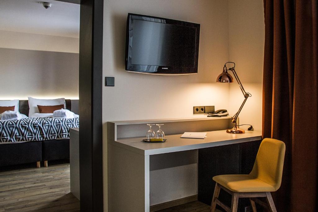 Postel nebo postele na pokoji v ubytování Hotel Alpenblick Kreischberg