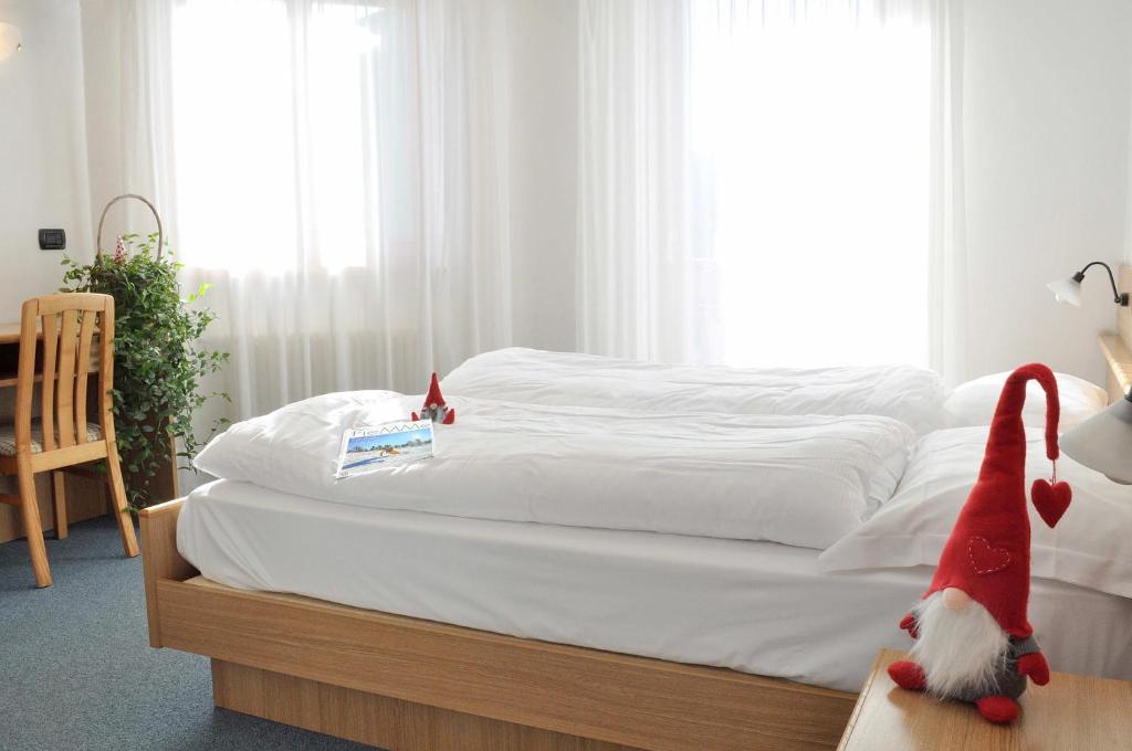 Postel nebo postele na pokoji v ubytování Albergo Antico