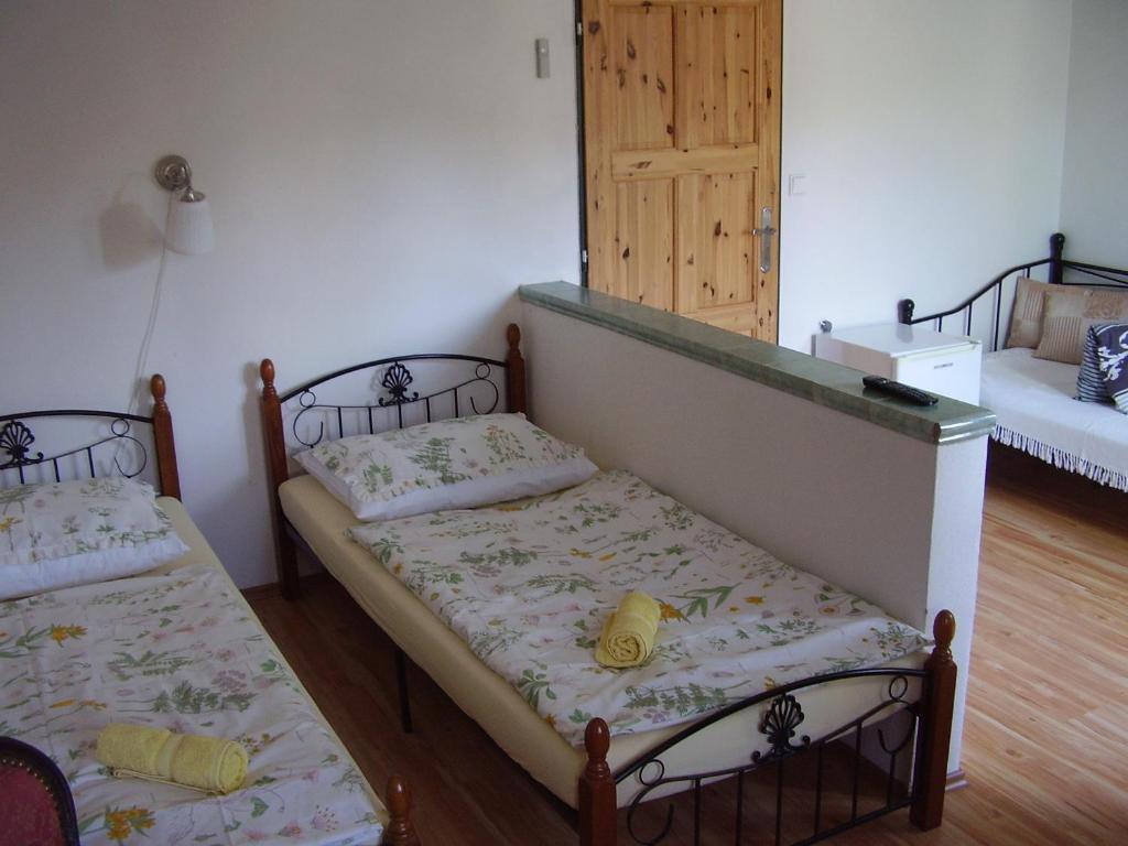 Postel nebo postele na pokoji v ubytování Penzion Večerka