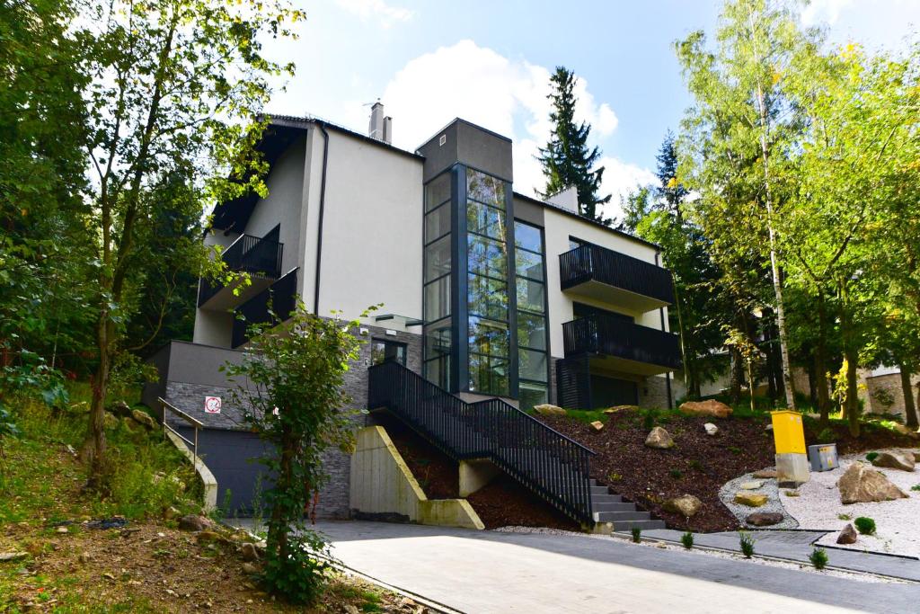 Ogród w obiekcie Apartament Szarotka - Apartamentuj