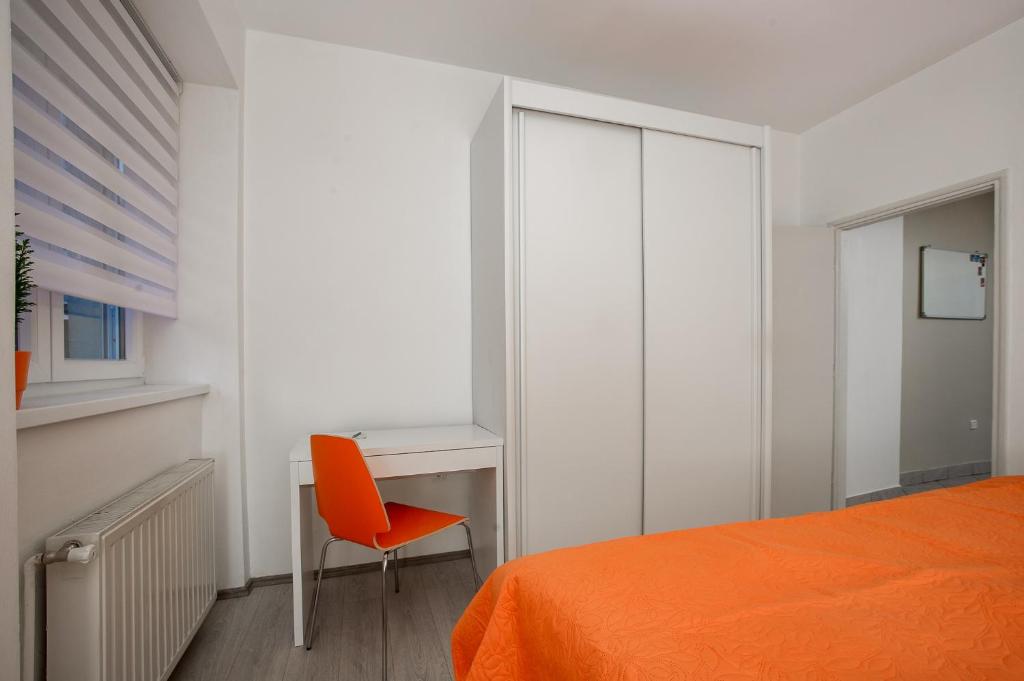 Posteľ alebo postele v izbe v ubytovaní Roze Apartment