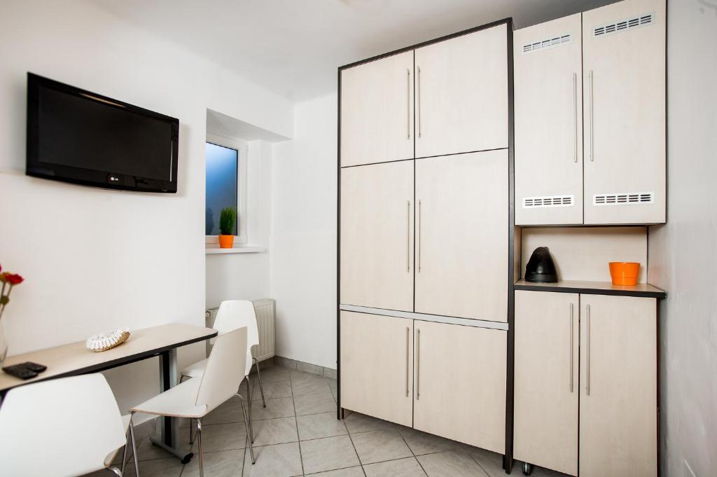 Kuchyňa alebo kuchynka v ubytovaní Roze Apartment